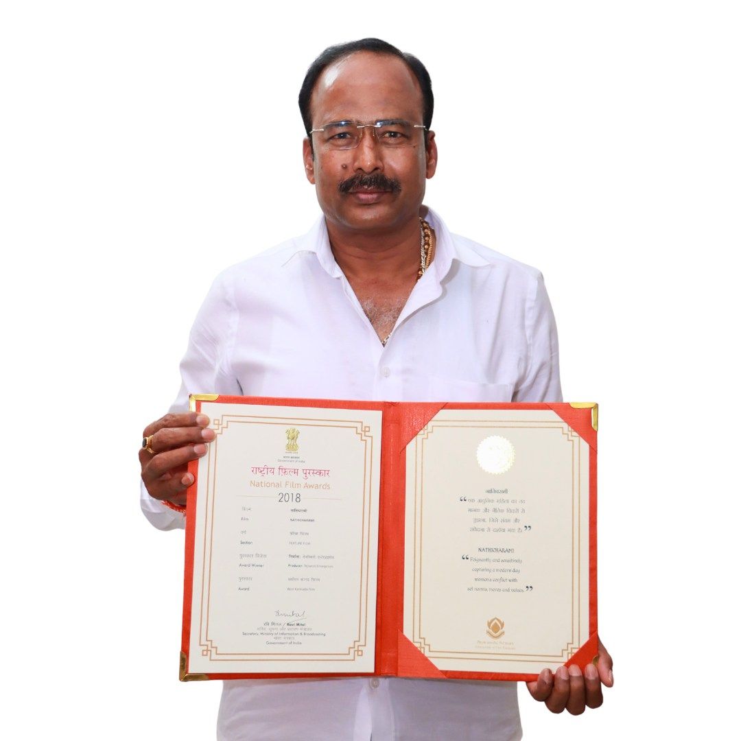 Ramesh Reddy Holding National Award Certificate